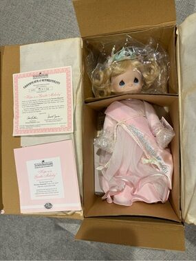 NIB Ashton Drake Precious Moments porcelain doll. “Hope is a Gentle Melody”
